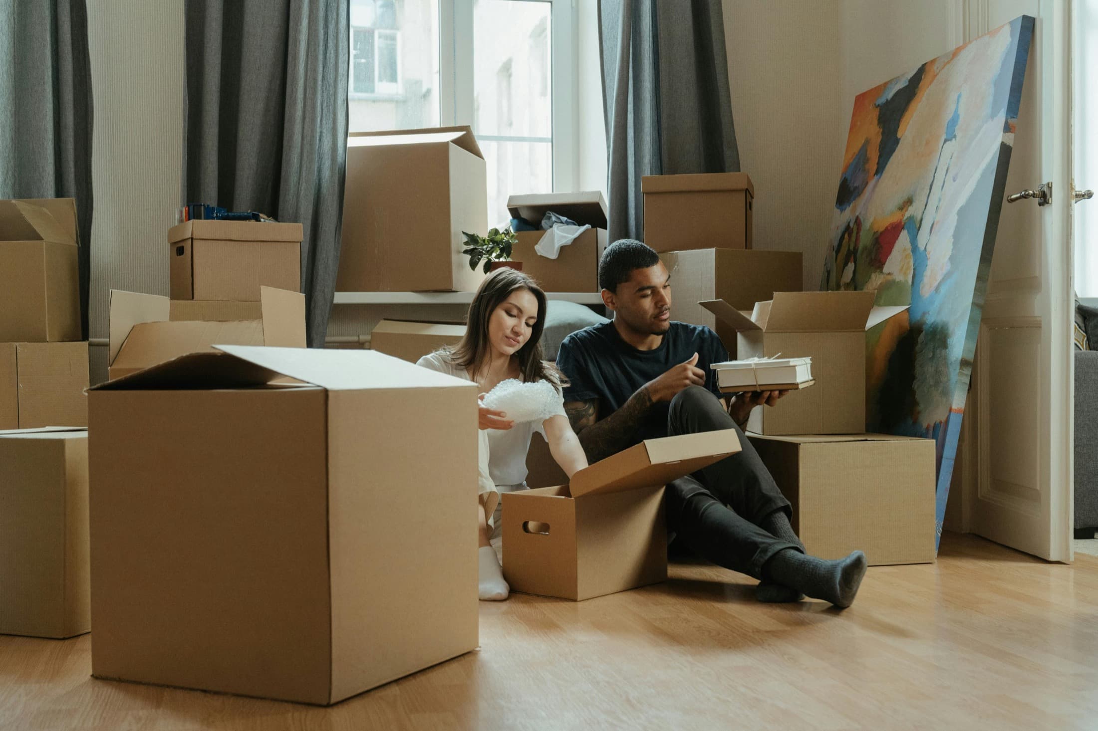 People unpacking boxes after move-in
