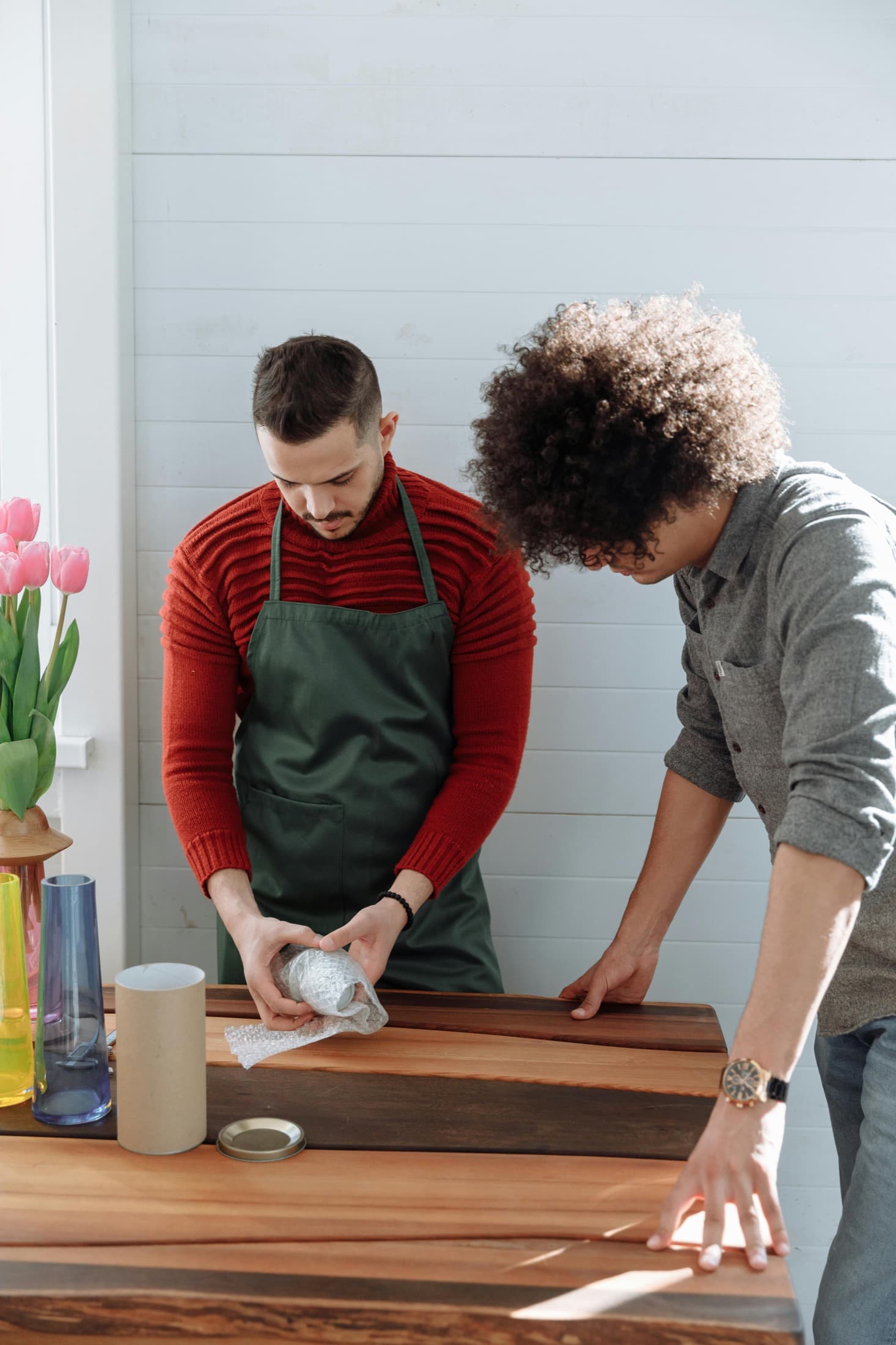 Men assembling furniture at home